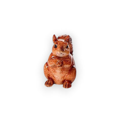 Mellow Monkey hand-painted brown resin squirrel figurine with a glossy finish and detailed textured fur.