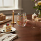 Mellow Monkey Happy Birthday stemless wine glass with gold foil lettering and colorful confetti pattern. 22oz capacity.