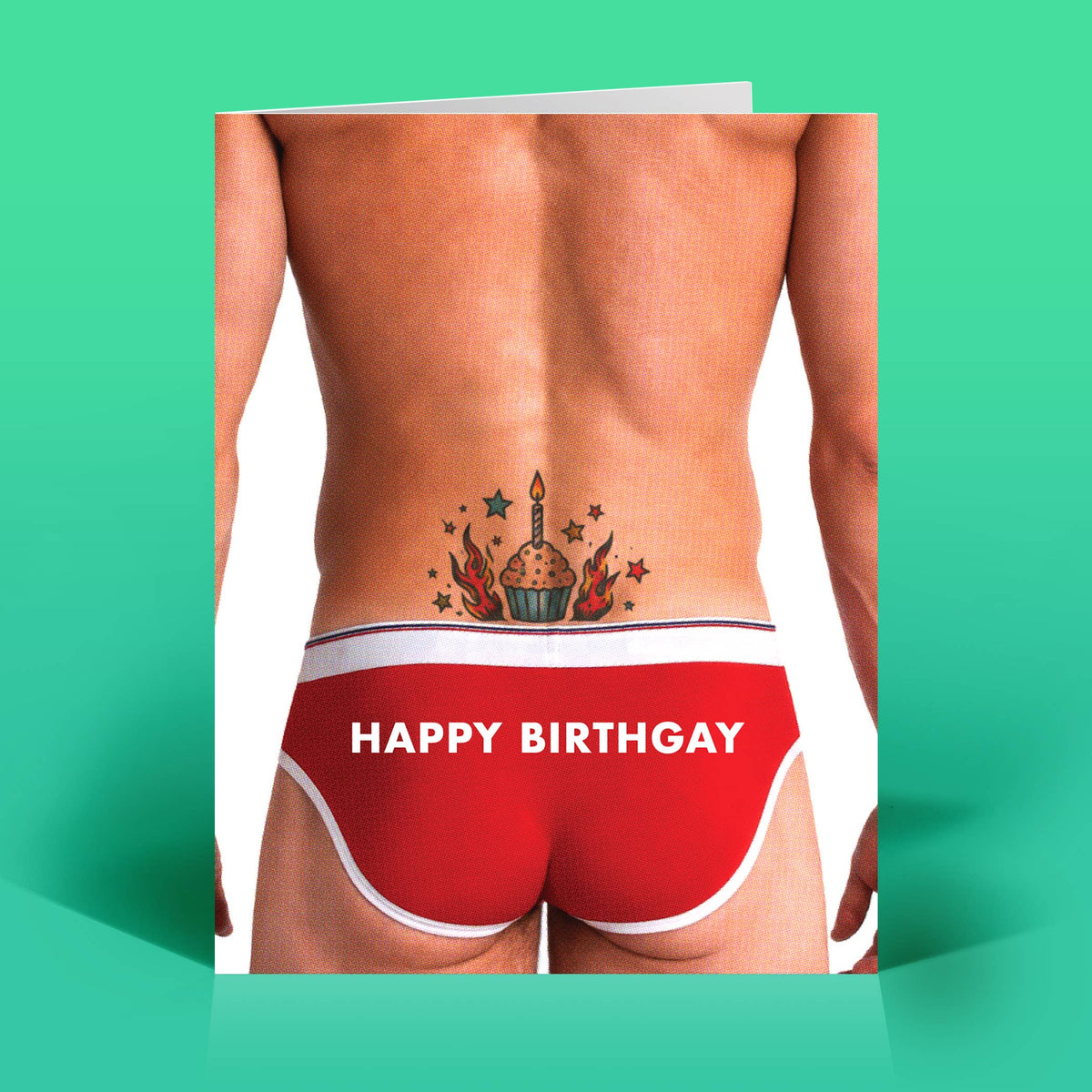 Mellow Monkey Happy Birthgay greeting card featuring a man in red briefs with a cupcake tattoo on his lower back.