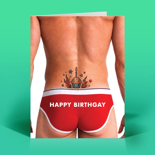 Mellow Monkey Happy Birthgay greeting card featuring a man in red briefs with a cupcake tattoo on his lower back.