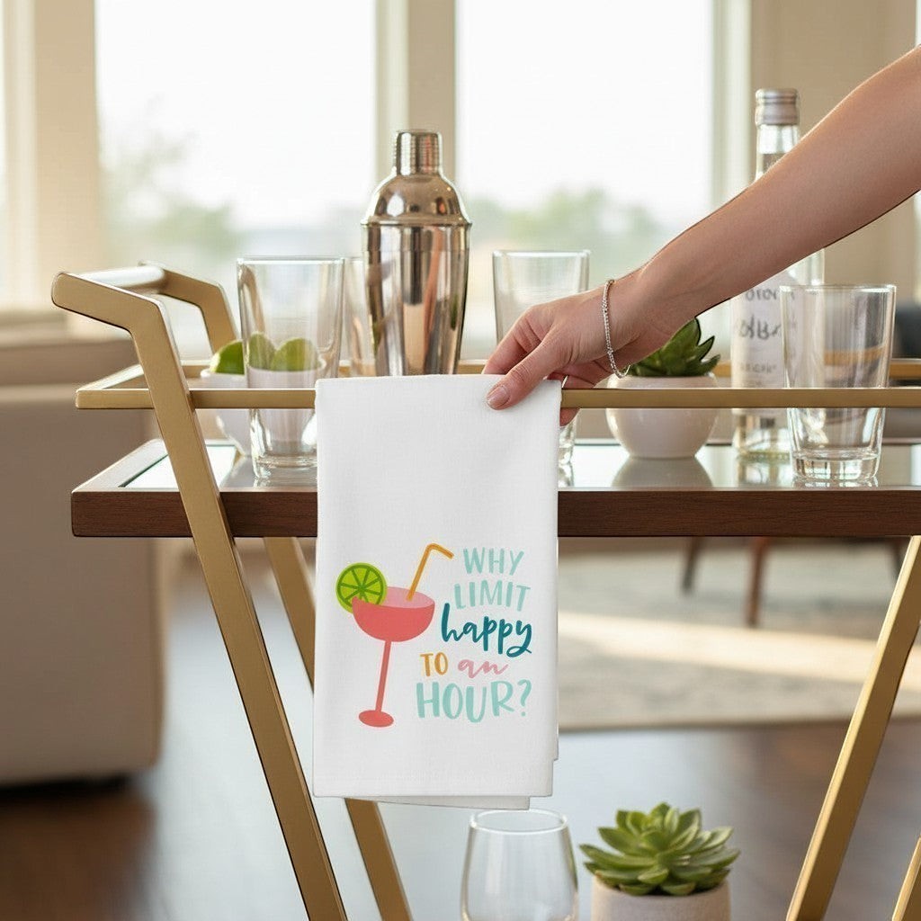 Mellow Monkey white 100% cotton kitchen towel with a pink cocktail and "Why Limit Happy Hour To An Hour?" text.