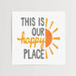 Mellow Monkey This Is Our Happy Place framed art print with grey and yellow text and a half sun graphic.
