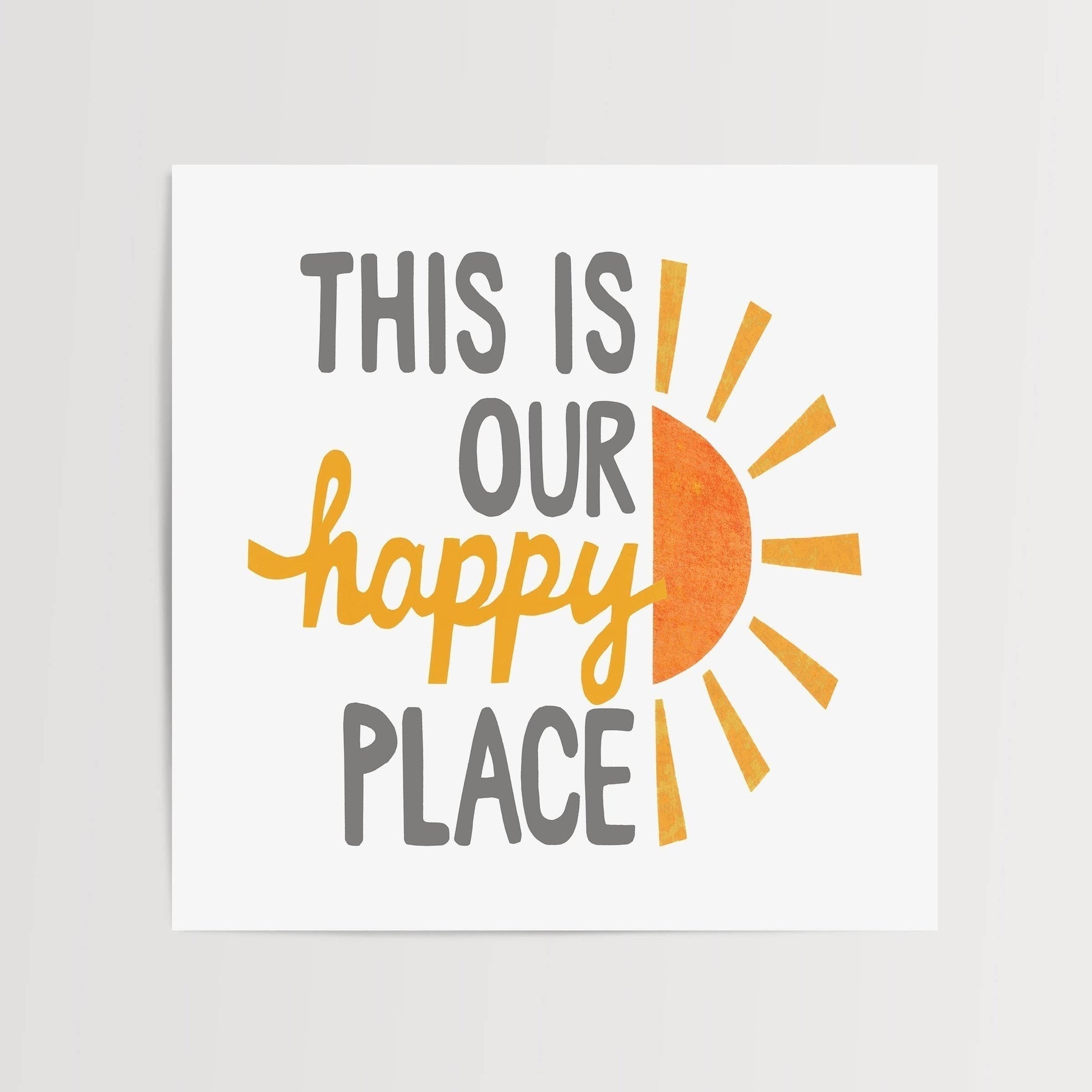 Mellow Monkey This Is Our Happy Place framed art print with grey and yellow text and a half sun graphic.