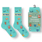Mellow Monkey Happy Retirement greeting card and soft teal socks set with vacation and leisure themed icons