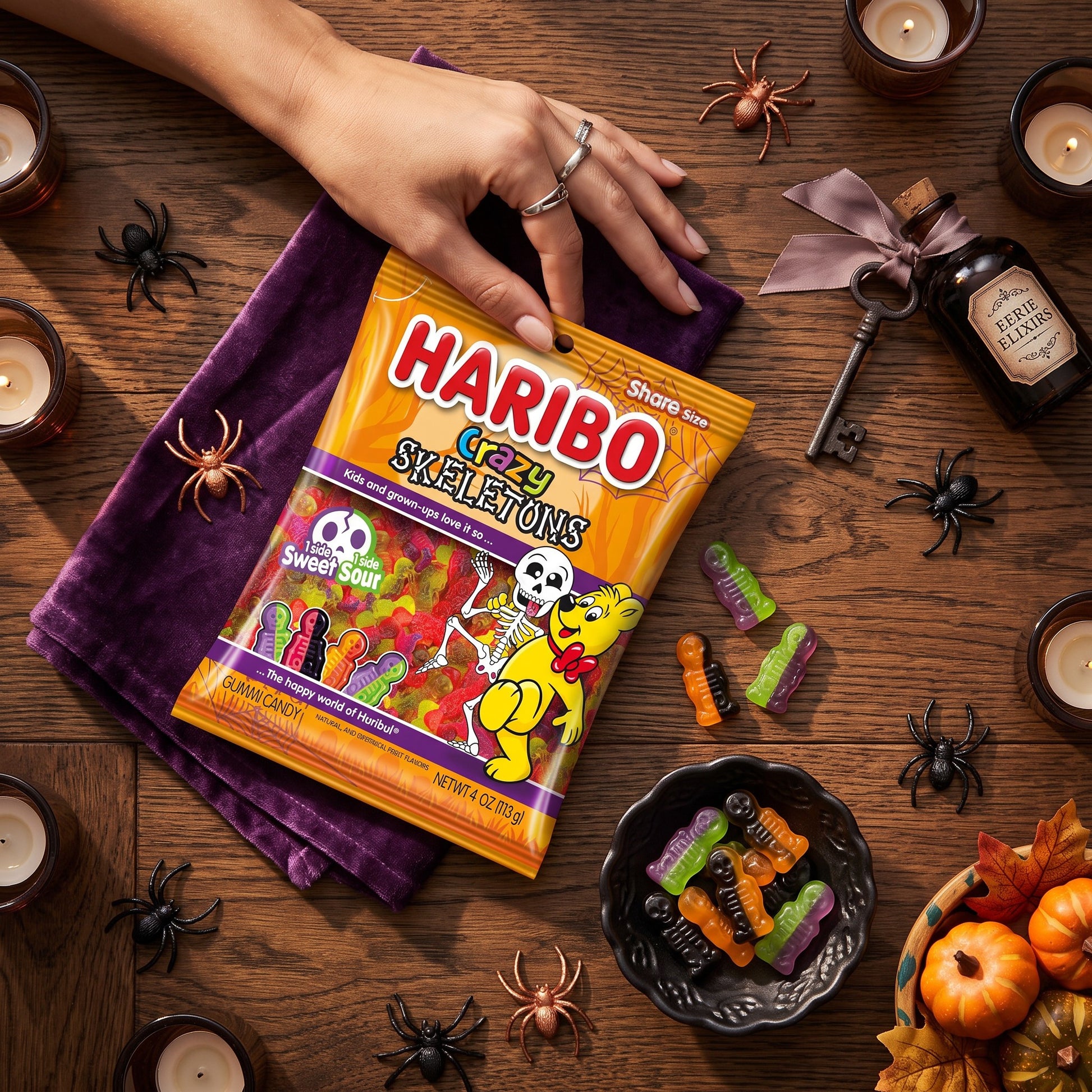 Mellow Monkey Haribo Halloween Crazy Skeletons gummy candy bag on a wooden table with spooky decorations