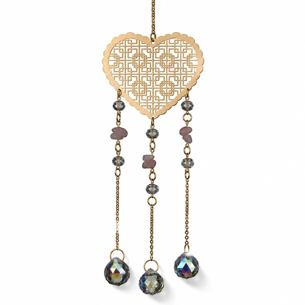 Mellow Monkey heart-shaped suncatcher with gold filigree, healing stones, and dangling crystals for rainbow light.