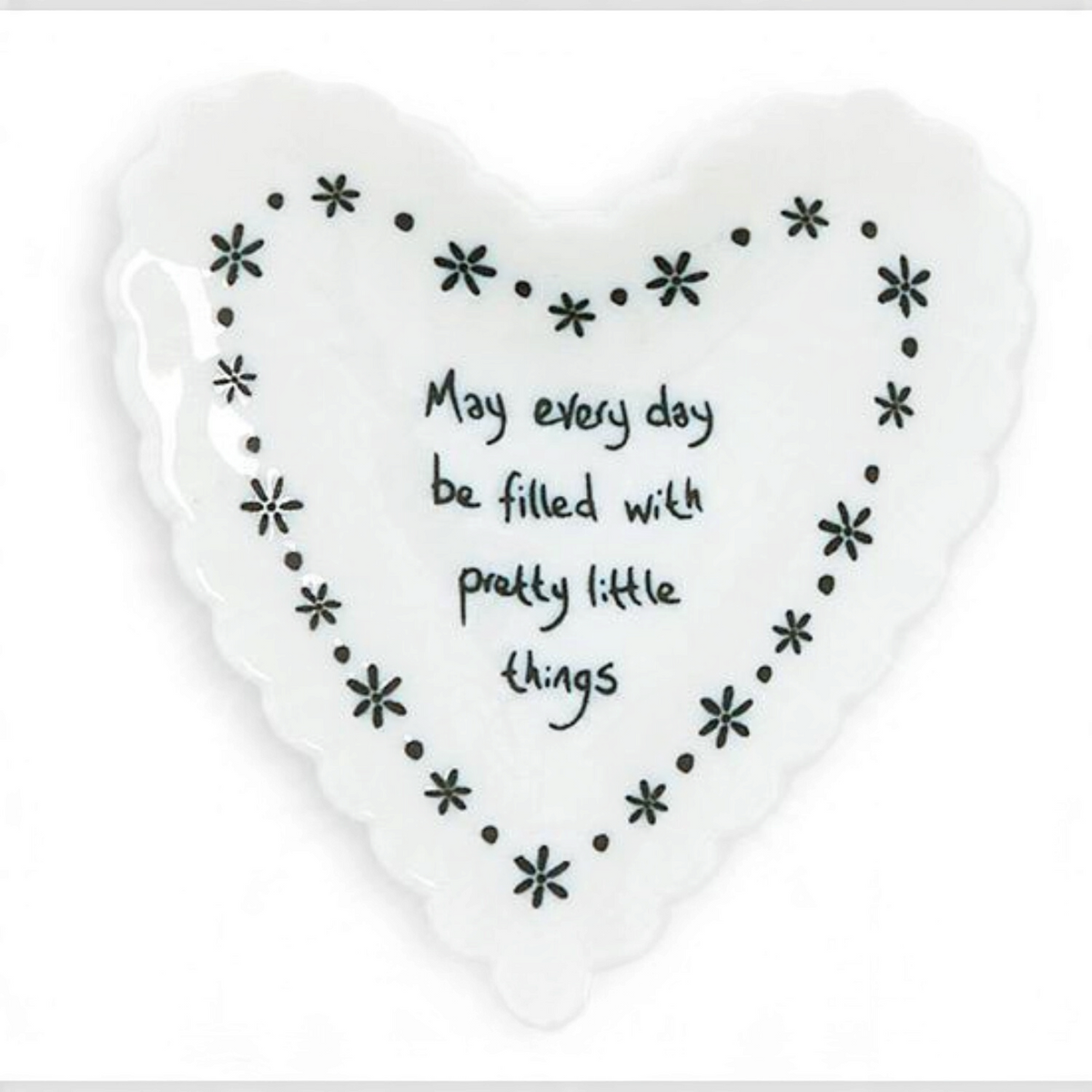 Mellow Monkey white porcelain heart-shaped trinket dish with scalloped edges and a floral sentiment message.