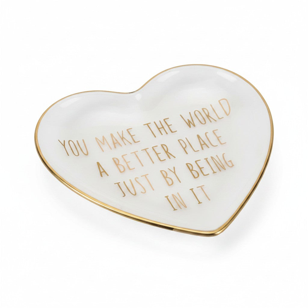 Mellow Monkey white ceramic heart-shaped trinket dish with gold foil text reading "You Make The World A Better Place Just By Being In It".