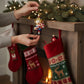 Mellow Monkey Hermey The Elf blown glass Christmas ornament holding a candy cane. 3.75-in.