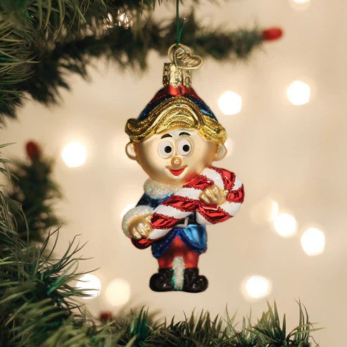 Mellow Monkey Hermey the Elf blown glass Christmas ornament holding a candy cane. Festive holiday decor.