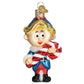 Mellow Monkey Hermey The Elf blown glass holiday ornament, holding a red and white candy cane. Features blue, red, and gold colors.