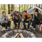 Mellow Monkey Hidden Rattlesnake prank device causing a surprised reaction among four friends camping by a fire.