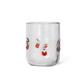 Mellow Monkey 16 oz clear glass featuring embedded colorful Santa and holiday icon patterns