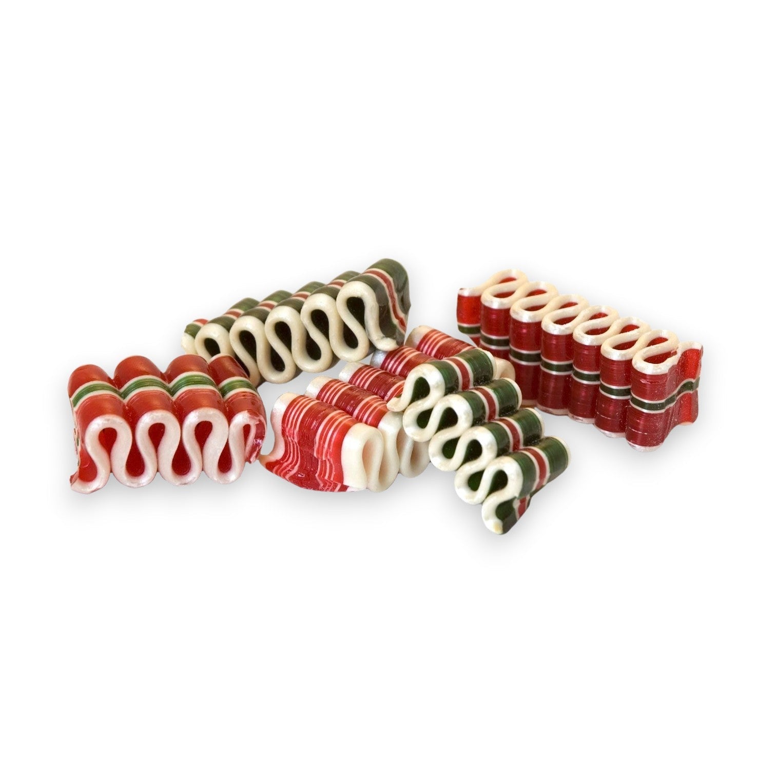 Mellow Monkey holiday ribbon candy in red, white, and green stripes with a delicate, wavy handcrafted design.