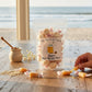 Mellow Monkey Honey Salt Water Taffy, individually wrapped in white paper with red accents. Net wt 6 oz.