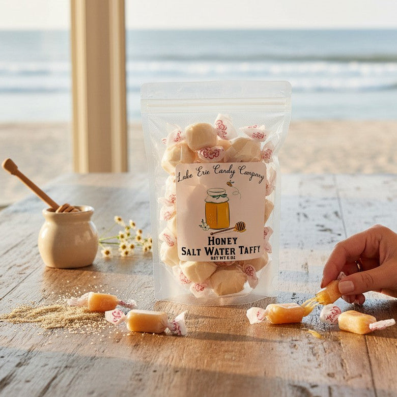 Mellow Monkey Honey Salt Water Taffy, individually wrapped in white paper with red accents. Net wt 6 oz.