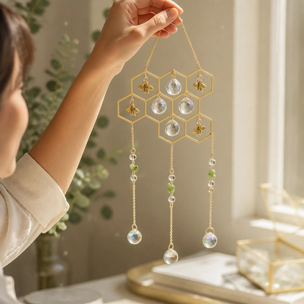 Mellow Monkey Honeycomb Daydream Ornament Suncatcher with gold bee accents, healing stones, and hanging crystals.