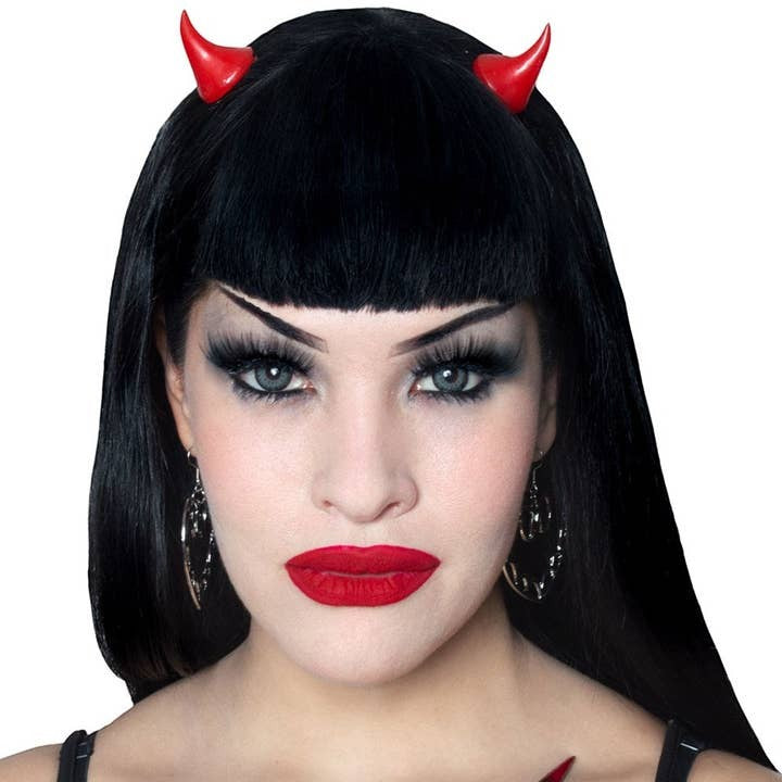 Mellow Monkey black and red resin devil horns worn by a woman with black hair for Halloween or cosplay costumes.