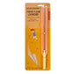 Mellow Monkey Huckleberry paper plane launcher made of FSC birch wood with elastic on a kraft card backing