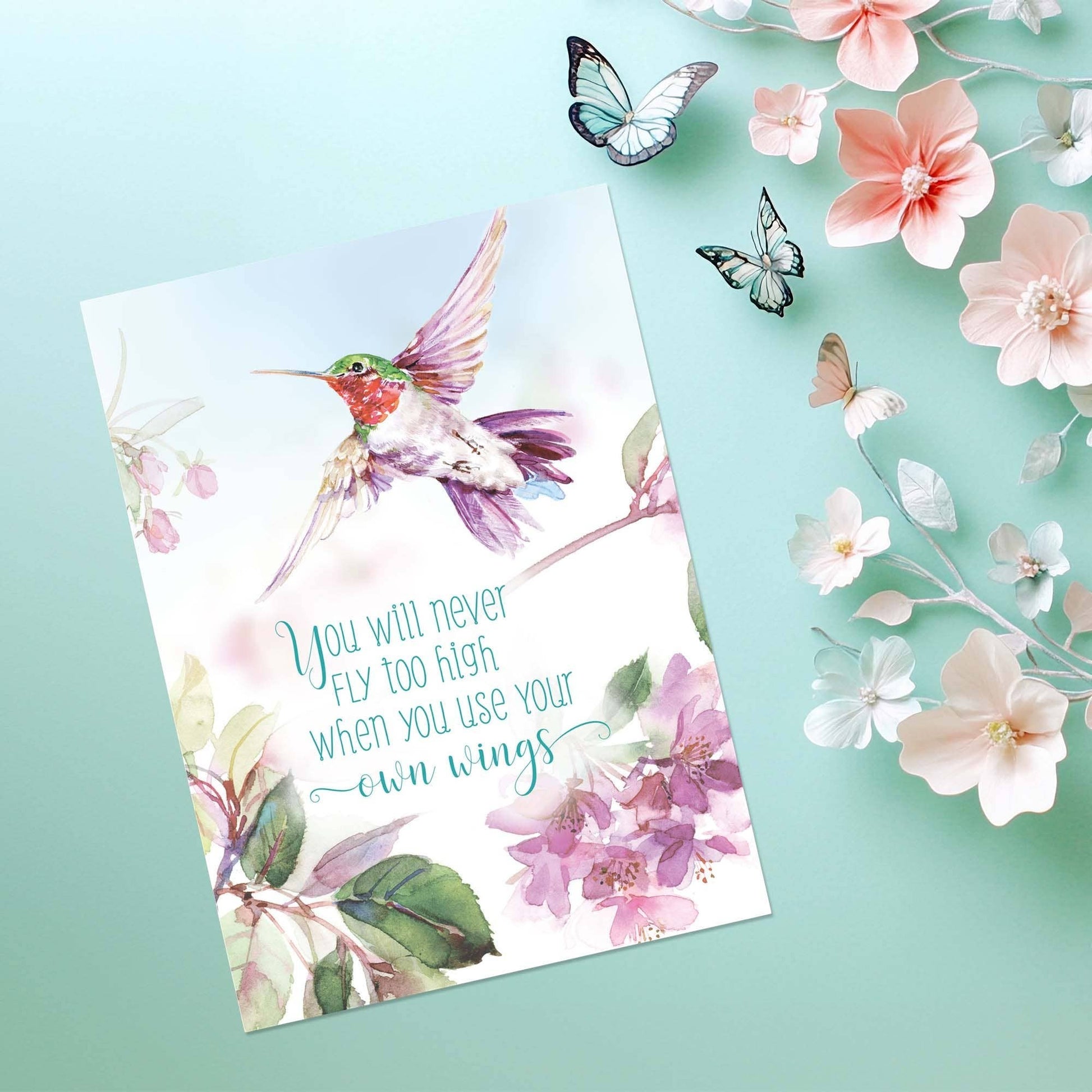 Mellow Monkey Wings of His Word religious greeting card featuring a watercolor hummingbird and floral design