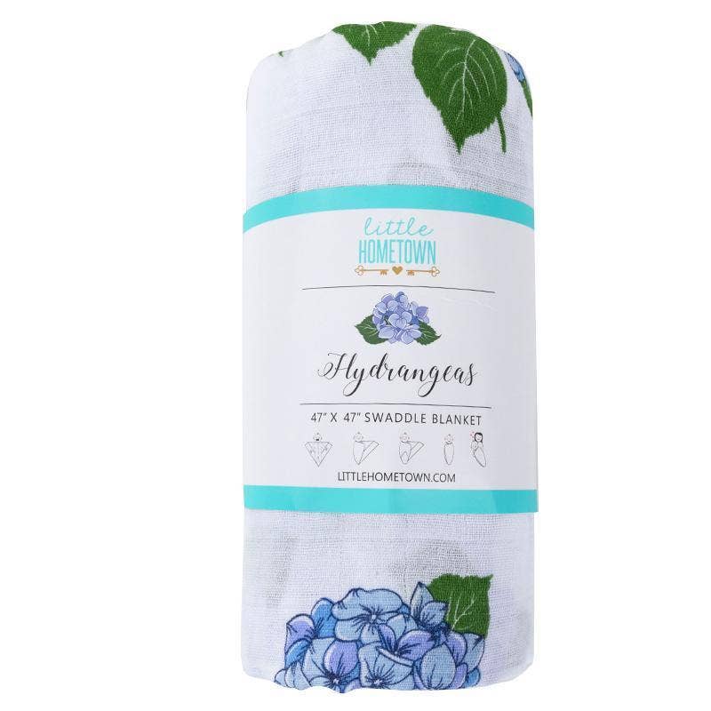 Mellow Monkey hydrangea print baby swaddle blanket made from soft bamboo and organic cotton muslin fabric.