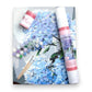 Mellow Monkey Happily Hydrangea paint by number kit with blue floral canvas, acrylic paints, and brushes.