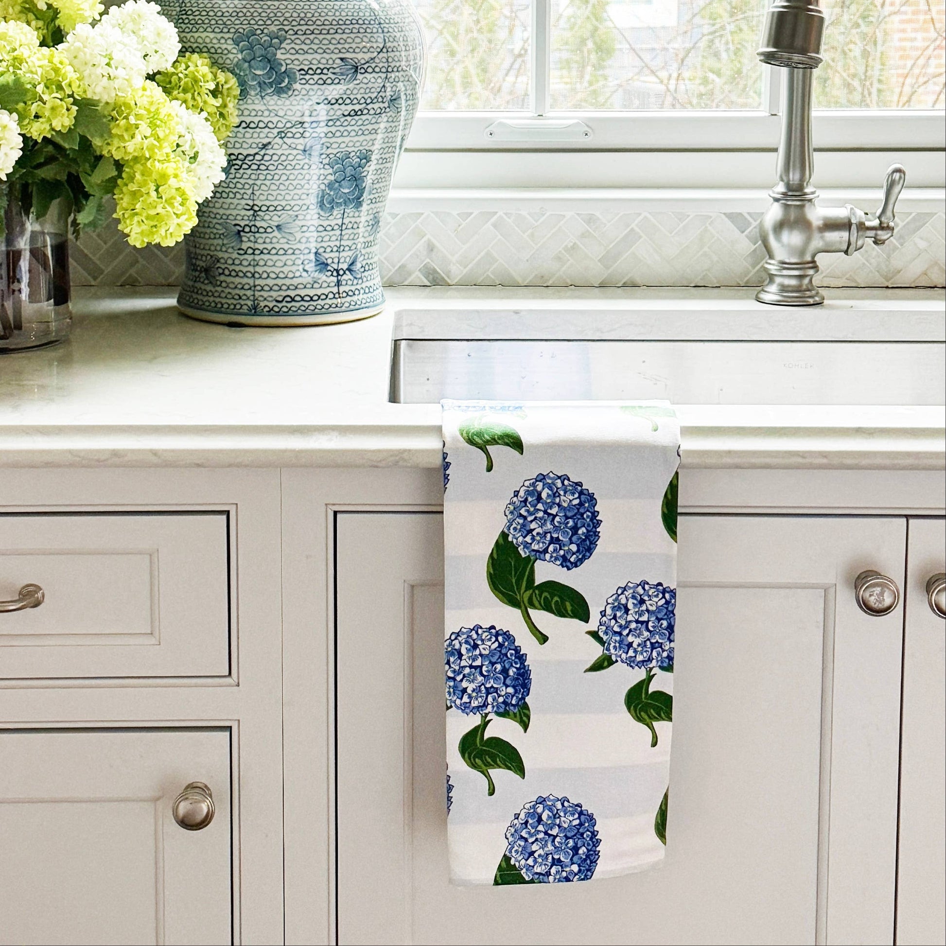 Mellow Monkey Hydrangea Stripe Cotton Tea Towel, 19"x29", blue floral print on white and grey striped background.