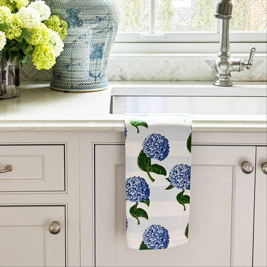 Mellow Monkey Hydrangea Stripe Cotton Tea Towel, 19"x29", blue floral print on white and grey striped background.