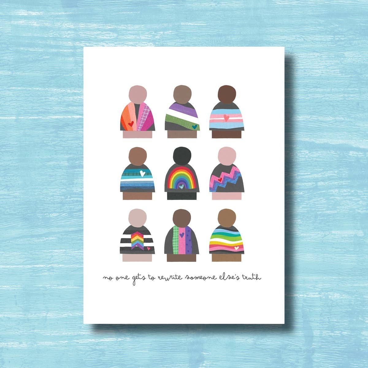 Mellow Monkey Inclusive Truth greeting card with colorful collage of figures in pride flag patterns and empowering text.