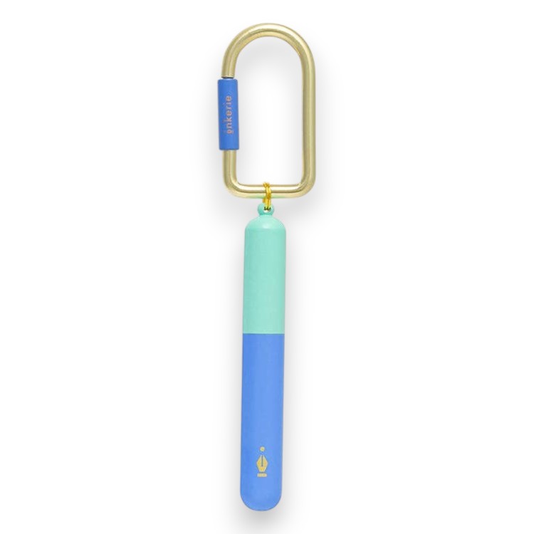 Mellow Monkey Inkerie keychain pen in two-tone blue and mint green with a gold carabiner attachment.