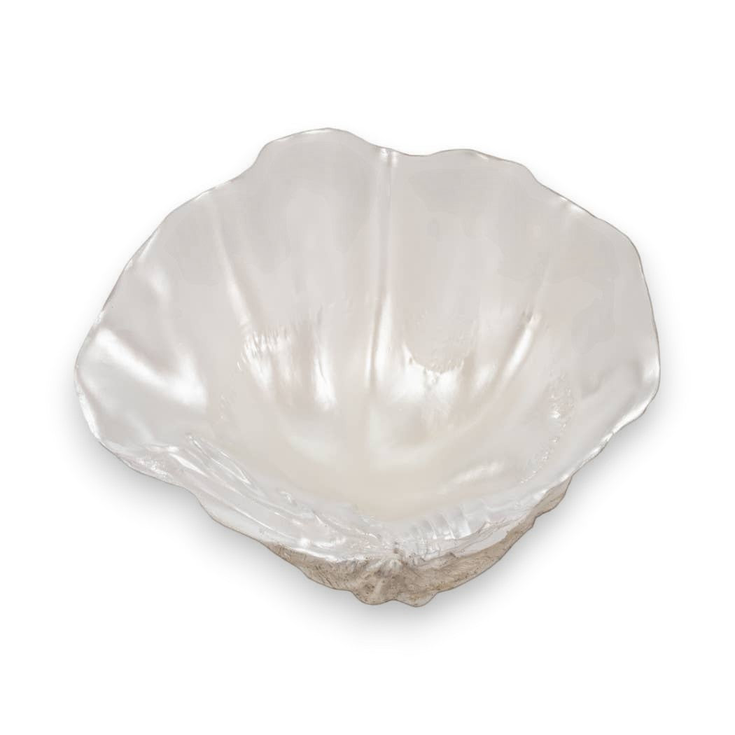 Mellow Monkey ivory resin decorative bowl with a pearlized coastal shell-inspired wave design for tabletop decor.