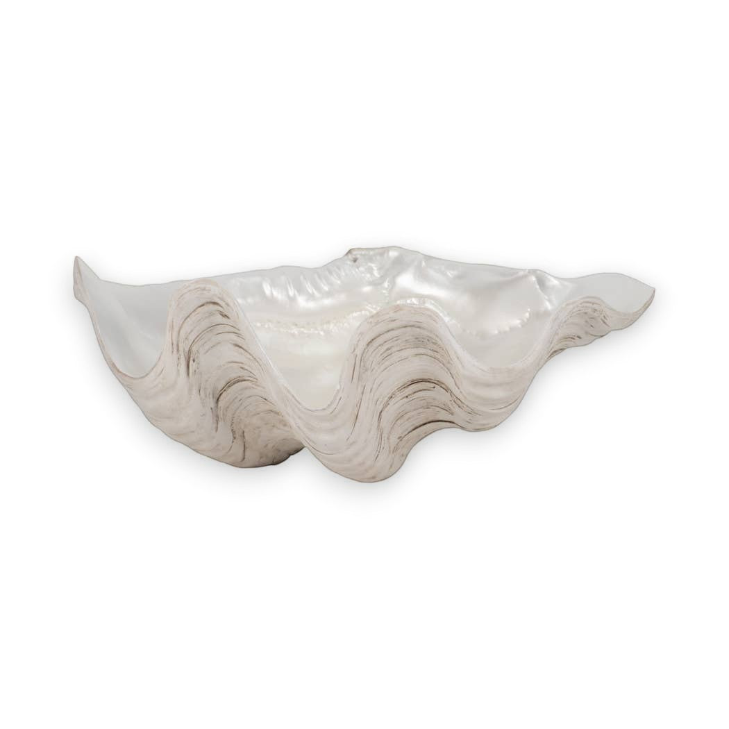 Mellow Monkey ivory and tan resin decorative bowl with a coastal shell-inspired wave design for home decor