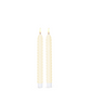 Mellow Monkey set of two 8.5-inch ivory twist taper flameless candles with a warm LED glow.