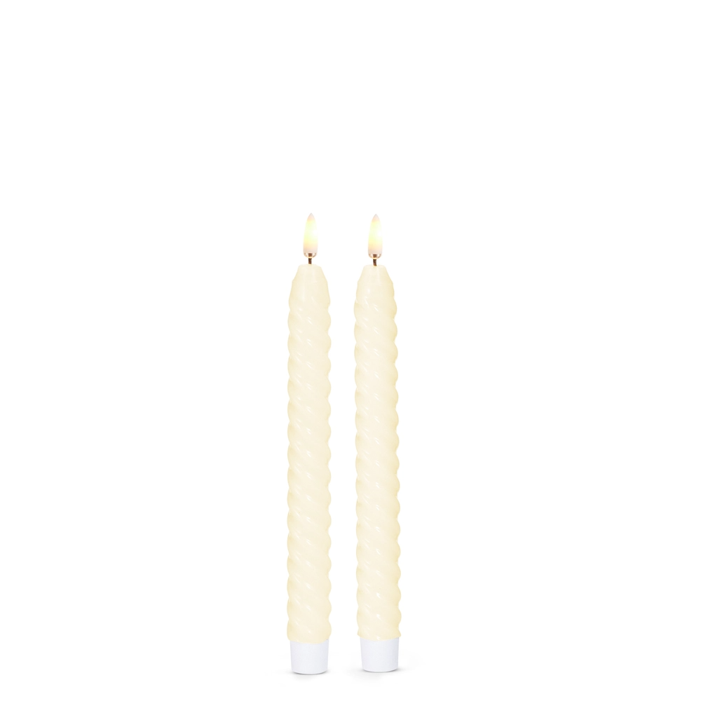 Mellow Monkey set of two 8.5-inch ivory twist taper flameless candles with a warm LED glow.