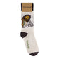 Mellow Monkey cream novelty socks featuring a Jesus graphic peeking from a door with the text I Saw That