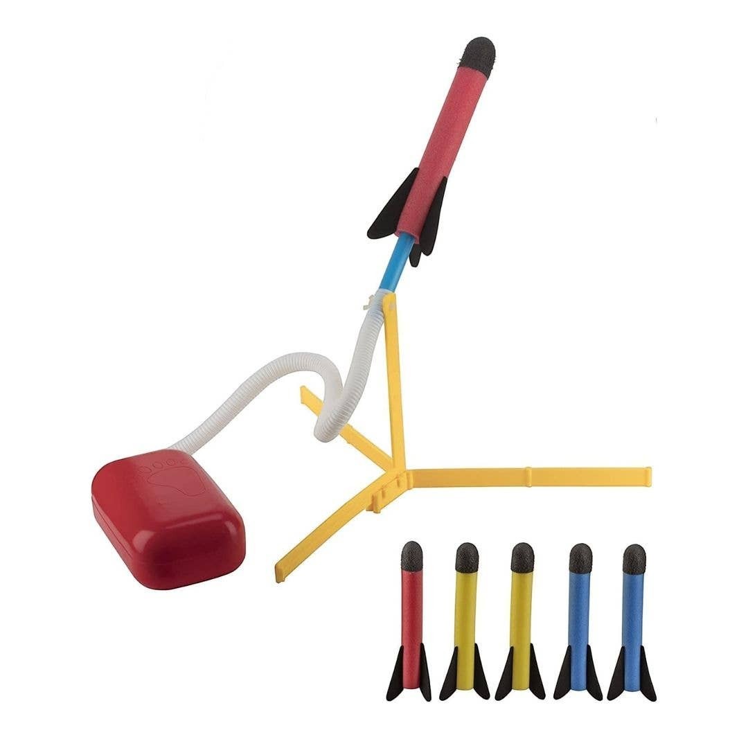 Mellow Monkey jump rocket launcher set with red stomp pad, yellow tripod stand, and six colorful foam rockets.