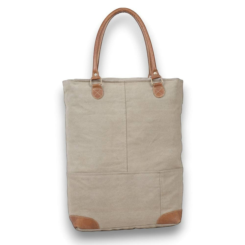 Mellow Monkey Quirky hues tote bag in beige organic jute with brown leather handles and base accents.