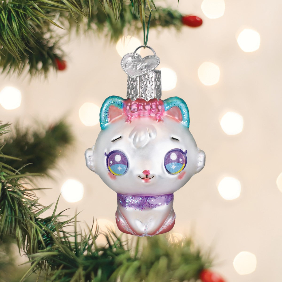 Mellow Monkey Mini Kawaii Cat blown glass holiday ornament with big eyes, pink bow, and glittery scarf.