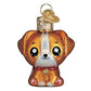 Mellow Monkey Mini Kawaii Dog blown glass holiday ornament, inspired by Japanese kawaii culture. Features big eyes, floppy ears, and a gold heart tag.