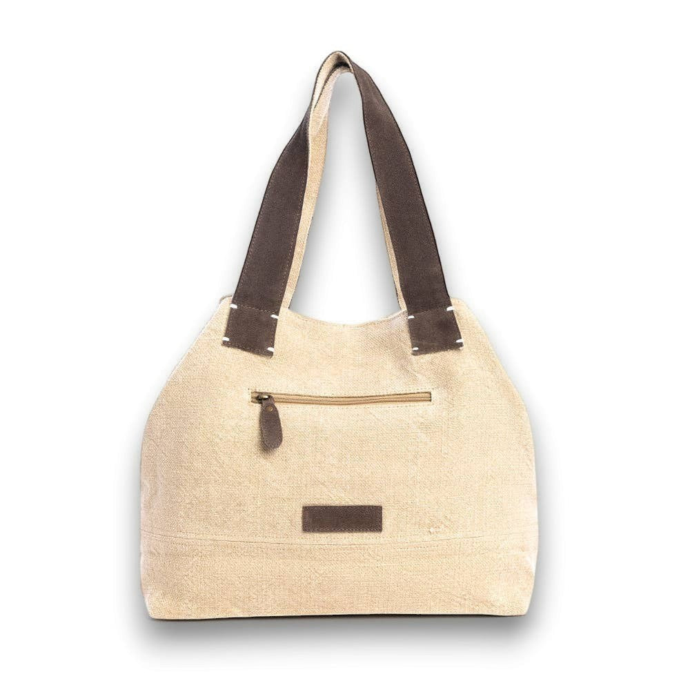Mellow Monkey Kendlie Mesa tote bag in wheat upcycled canvas with chocolate suede handles and back zipper pocket.
