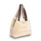 Mellow Monkey Kendlie Mesa tote bag in wheat upcycled canvas with chocolate suede handles and decorative stitching.