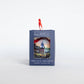 Mellow Monkey decoupage Christmas ornament featuring Kim Hovell Downtown Christmas artwork in a display box