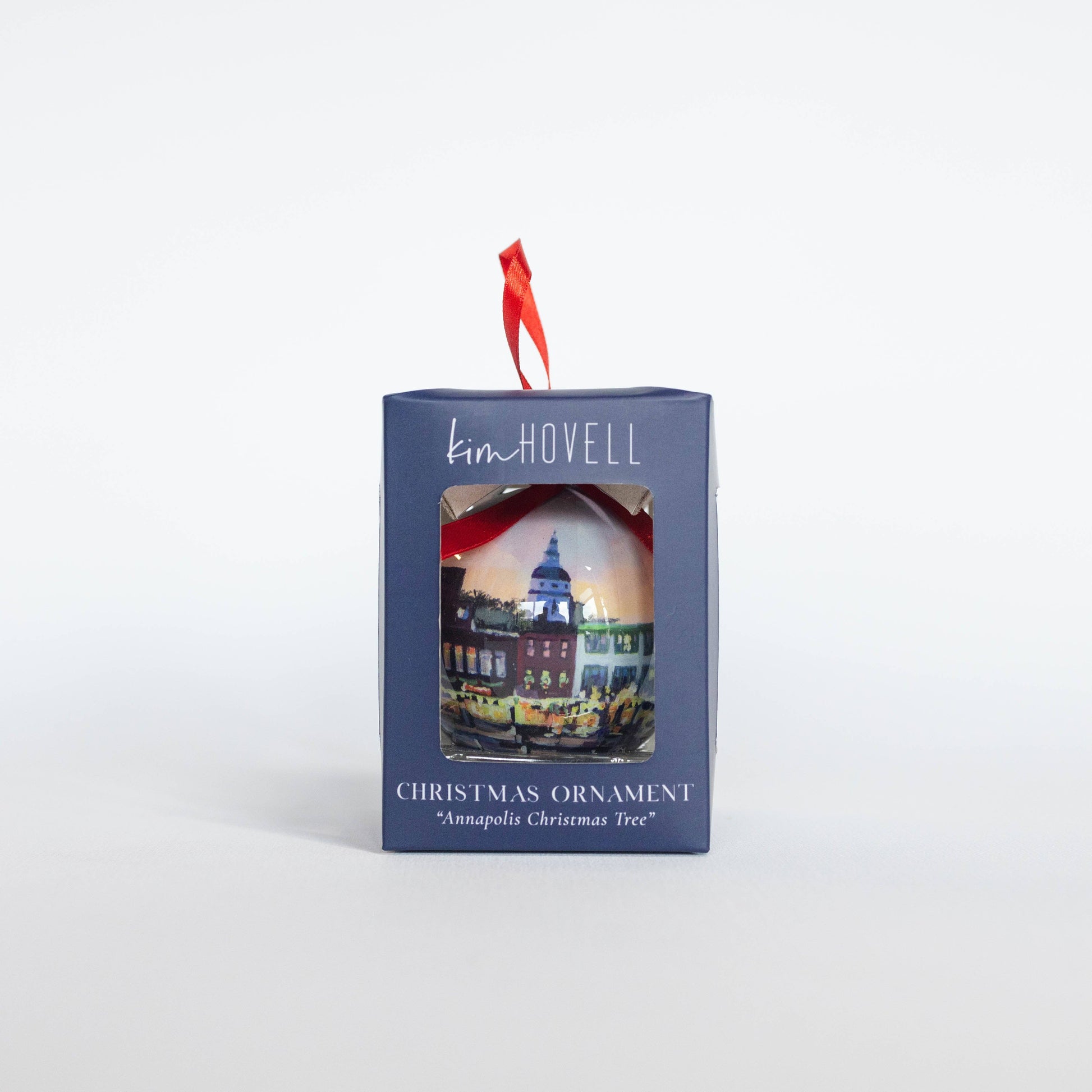 Mellow Monkey decoupage Christmas ornament featuring Kim Hovell Downtown Christmas artwork in a display box