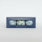 Mellow Monkey Kim Hovell Shell Trio decoupage ornament set in a blue gift box featuring coastal art designs