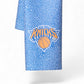 Mellow Monkey Knicks Grip tea towel in blue with a basketball texture pattern and New York Knicks team logo