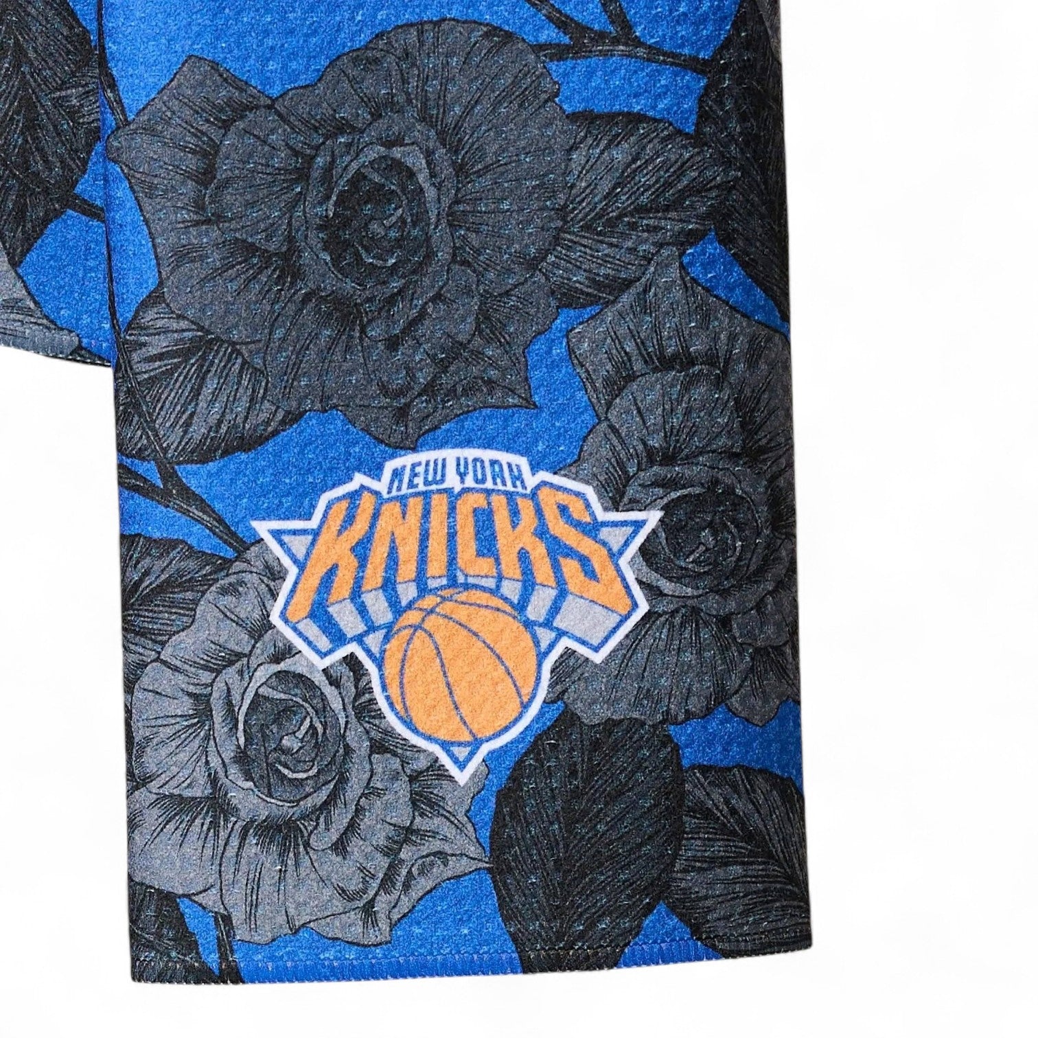 Mellow Monkey Knicks floral tea towel in blue and black with New York Knicks basketball team logo