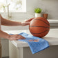 Mellow Monkey Knicks Grip tea towel featuring blue dotted pattern and team logo, displayed on a kitchen counter.