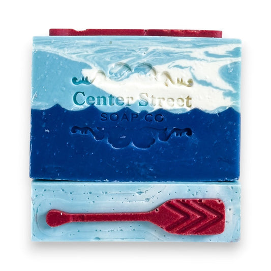 Mellow Monkey Lake House Summer handmade soap bar, 4oz, with blue and white swirls, ocean waves, and a red oar detail.