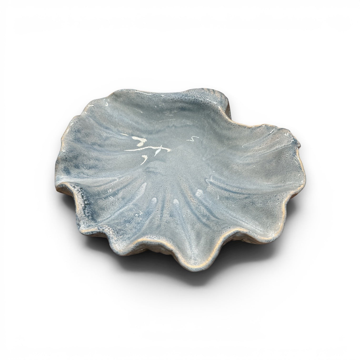 Mellow Monkey large ceramic shell bowl in dusty blue with a reactive glaze and organic, clam-inspired silhouette.