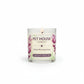 Mellow Monkey Pet House Lavender Green Tea scented candle in a clear glass jar with watercolor floral label
